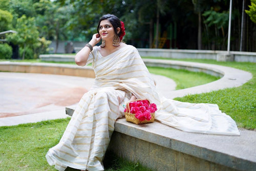 Cotton Golden Lines Saree with Elegant Tassels