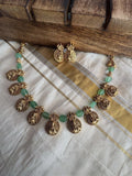Lakshmi with green beads necklace